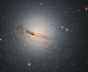 O galaxie muribundă a fost fotografiată de Hubble. Calea Lactee trăiește pentru că e de tip "canibal"!